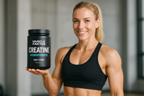 A fit blonde female woman holding the Muscle Faktor creatine monohydrate product.