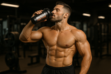 Fitness athlete drinking protein shake after workout