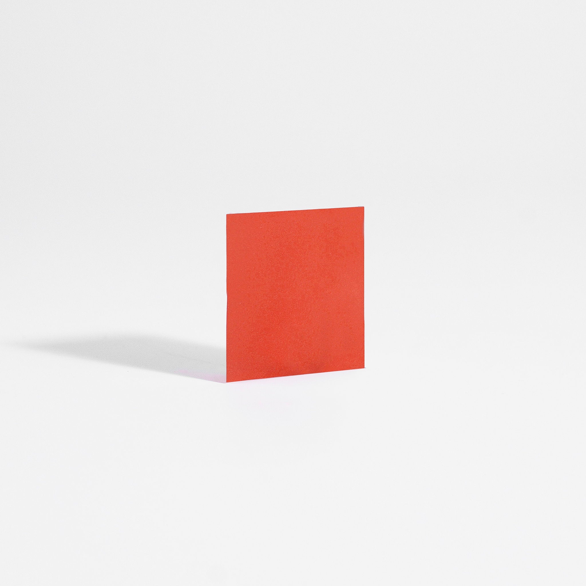 Muscle Faktor fast acting workout energy supplement in a red square packet on a white background